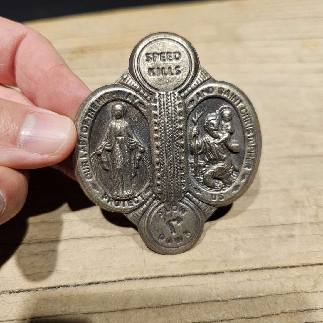 Aluminum St. Christopher Patron of Safe Travel Visor Clip: Title:Aluminum St. Christopher Patron of Safe Travel Visor ClipDescription:1 5/8" tall x 3" wide Wonderful St christopher visor clip. Good detail aluminum, slightly aged to look like an antique.