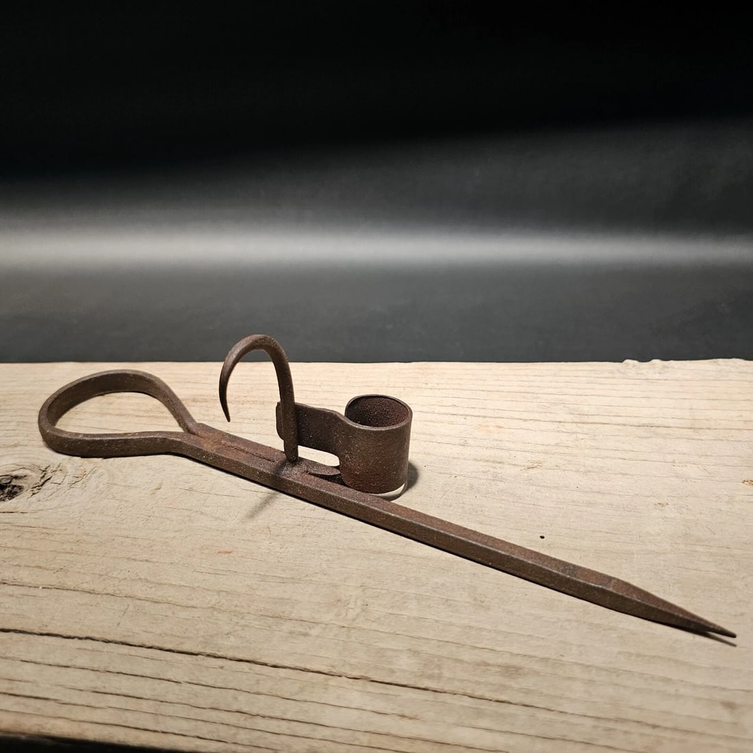 Forged Wrought Iron Mining Sticking Tommy Miners Candlestick: Title:Forged Wrought Iron Mining Sticking Tommy Miners CandlestickDescription:10 1/2" Long Nice Reproduction iron miners candle holder. Great handmade distressed to look like an antique.... Miner