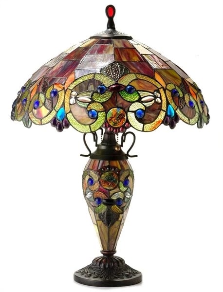 24 1/2" Stained Glass Lighted Base Table Lamp: Title:24 1/2" Stained Glass Lighted Base Table Lamp Description:24 1/2" Tall x 18" Wide Wonderful reproduction stained glass double lit top and lighted base table lamp, a stunning work of art that com