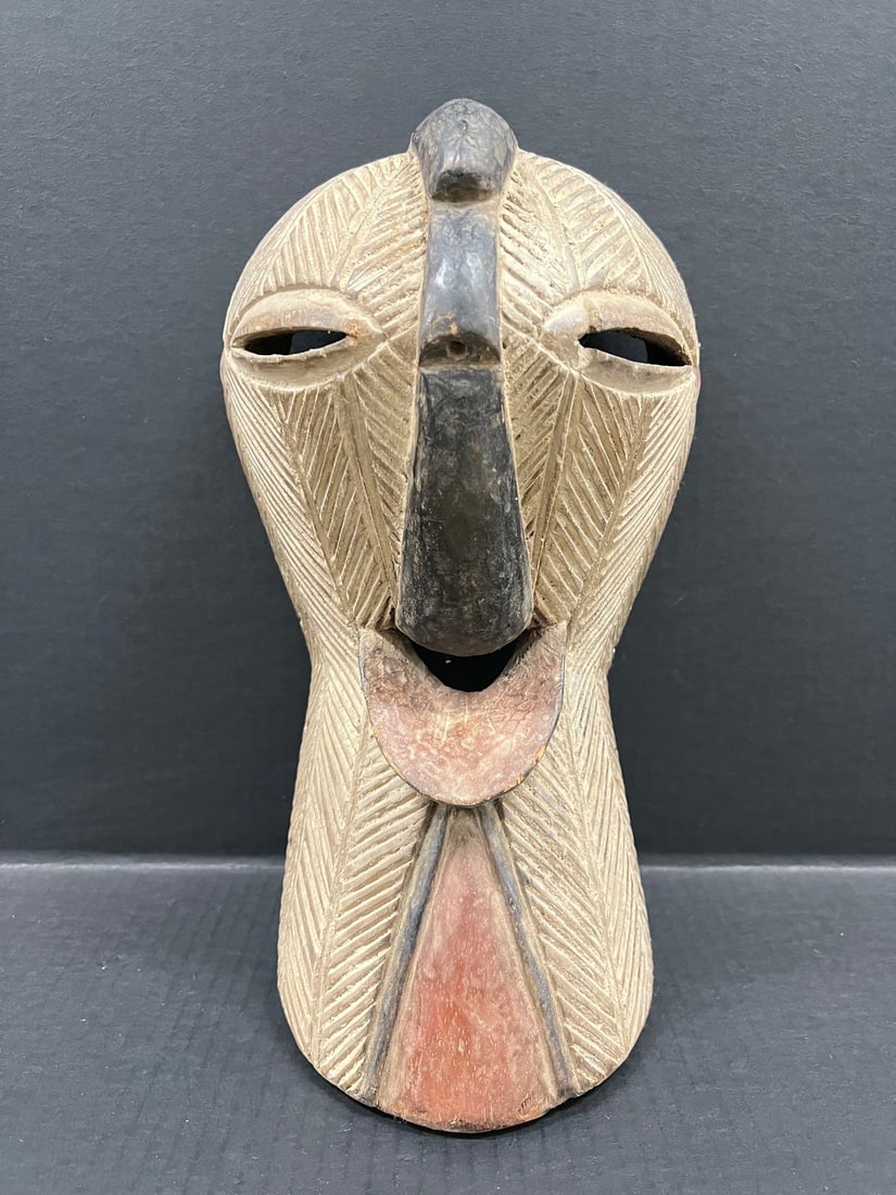 Songye Mask: Title: Songye Mask Description: African Tribal Art Songye Mask Date/Period: Late 20th Century Materials: Wood Size: 15.5" h x 8" w Reserve: $300.00 Shipping:Domestic: Flat-rate of