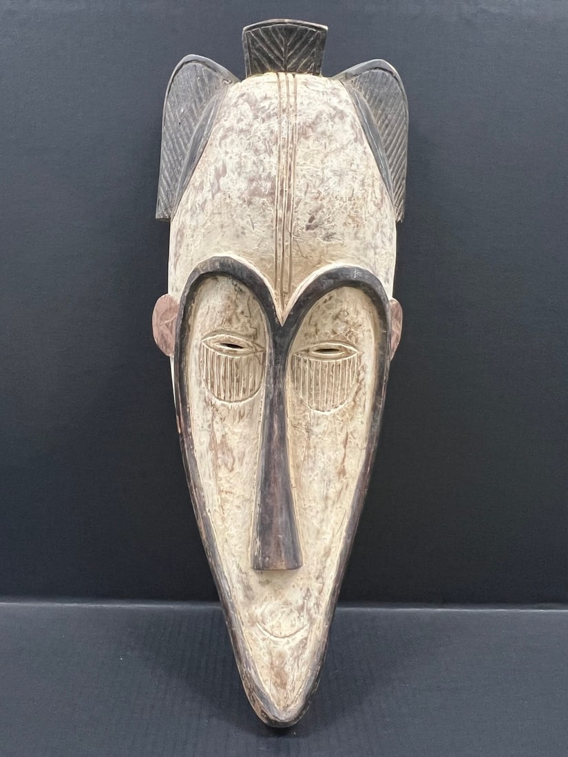 Fang Mask: Title: Fang Mask Description: African Tribal Art Fang Mask Date/Period: Late 20th Century Materials: Wood Size: 23" h x 9" w Reserve: $300.00 Shipping:Domestic: Flat-rate of $30.00 to