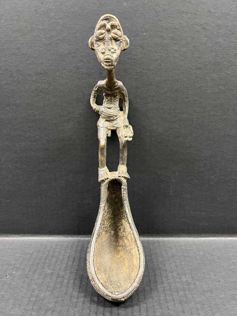 Dogon Bronze Spoon: Title: Dogon Bronze Spoon Description: African Tribal Art Dogon Bronze Spoon Date/Period: Late 20th Century Materials: Bronze Size: 12.5" h x 3" w Reserve: $300.00 