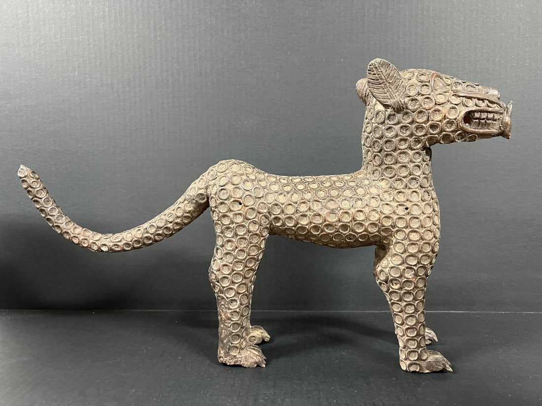 Bronze Leopard Sculpture: Title: Bronze Leopard Sculpture Description: African Tribal Art Bronze Leopard Sculpture Date/Period: Late 20th Century Materials: Bronze Size: 12.5" h x 20.25" w Reserve: $1,200.00 