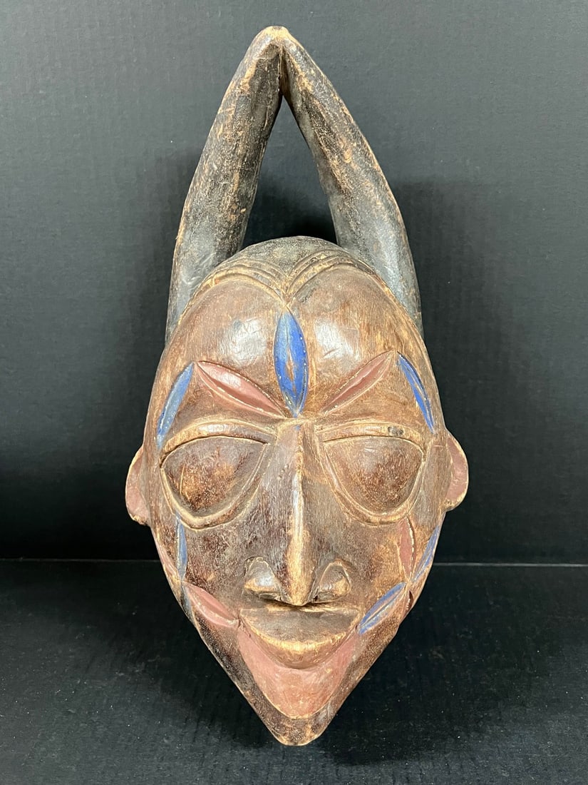 Yuroba Mask: Title: Yuroba Mask Description: African Tribal Art Yuroba Mask Date/Period: Late 20th Century Materials: Wood Size: 16" h x 9.5" w Reserve: $200.00 Shipping:Domestic: Flat-rate of