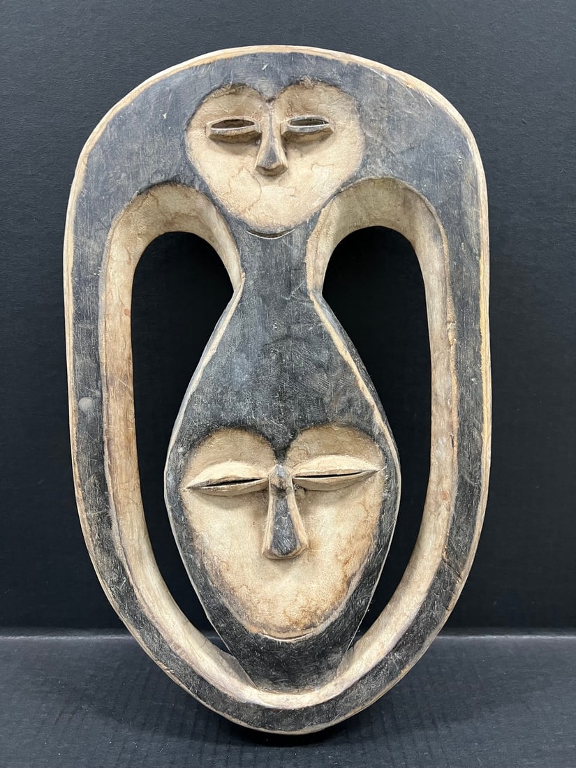 Kwele Mask: Title: Kwele Mask Description: African Tribal Art Kwele Mask Date/Period: Late 20th Century Materials: Wood Size: 16.5" h x 10.5" w Reserve: $200.00 Shipping: Domestic: Flat-rate of $30.0