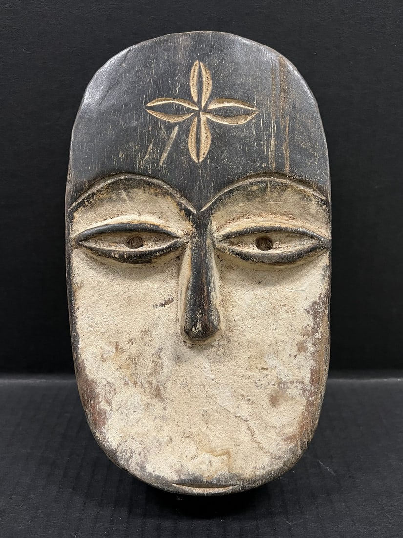 Kwele Mask: Title: Kwele Mask Description: African Tribal Art Kwele Mask Date/Period: Late 20th Century Materials: Wood Size: 9" h x 5.5" w Reserve: $200.00 Shipping:Domestic: Flat-rate of $30.00