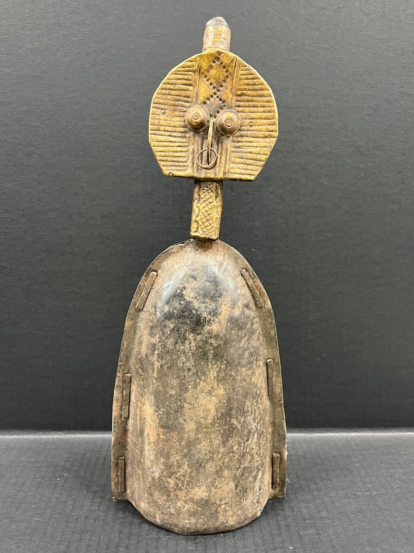 Bakota Bell: Title: Bakota Bell Description: African Tribal Art Bakota Bell Date/Period: Late 20th Century Materials: Wood Size: 17" h x 6.5" w Reserve: $300.00 Shipping: Domestic: Flat-rate of $30.00
