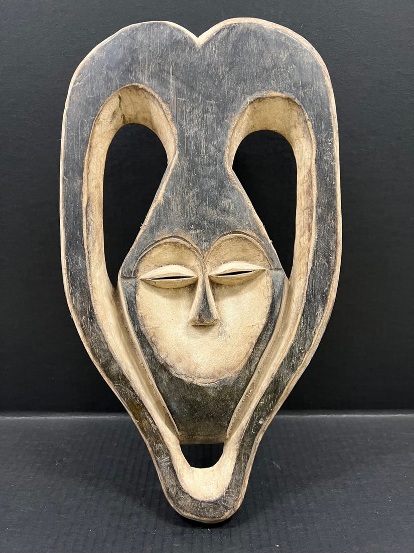 Kwele Mask: Title: Kwele Mask Description: African Tribal Art Kwele Mask Date/Period: Late 20th Century Materials: Wood Size: 17" h x 10" w Reserve: $200.00 Shipping: Domestic: Flat-rate of $30.00 to