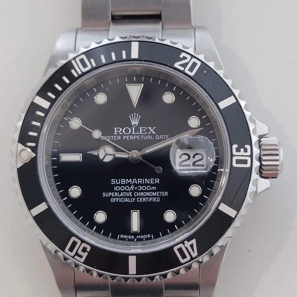 Rolex Oyster Date 16610T Submariner Mens 40mm 2000s Automatic All Original RA686: Title:Rolex Oyster Date 16610T Submariner Mens 40mm 2000s Automatic All Original RA686Description:Iconic classic, Men's Rolex Oyster Perpetual Datejust Ref. 1603 automatic, c.1968, in excellent