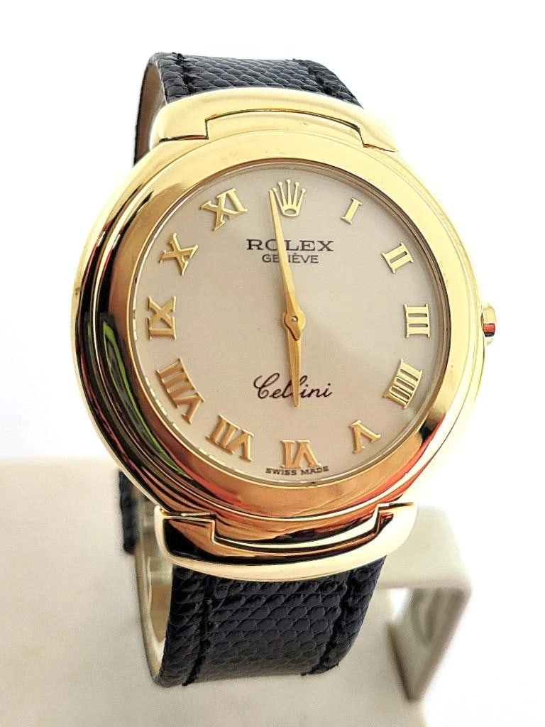 UNISEX Solid 18k ROLEX CELLINI 37 mm Quartz Watch c.1990 Ref. 6623 EXLNT: UNISEX Solid 18k ROLEX CELLINI 37 mm Quartz Watch c.1990 Ref. 6623 EXLNT Reserve: $5,200.00 Shipping: Domestic: Flat-rate of $75.00 to anywhere within the contiguous U.S. International: Foreign shippi