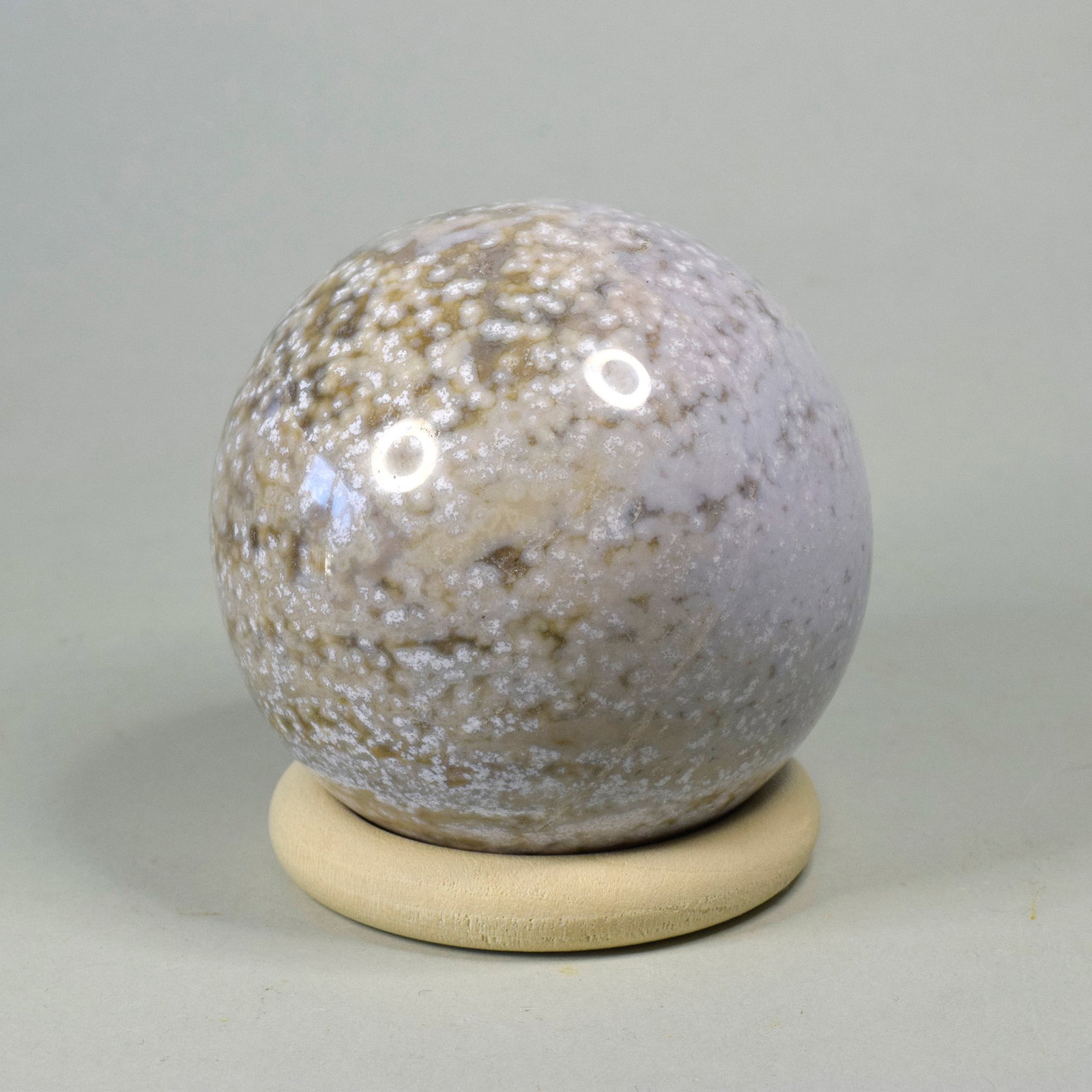 6.5 cm Polished Ocean Jasper sphere: Title: 6.5 cm Polished Ocean Jasper sphereOrigin: MadagascarSize: 6.5 cm diameterDescription: Species: Jasper (Ocean Jasper) Locality: Madagascar Diameter: 6.5 cm Weight: 0.37 kg Fine polished