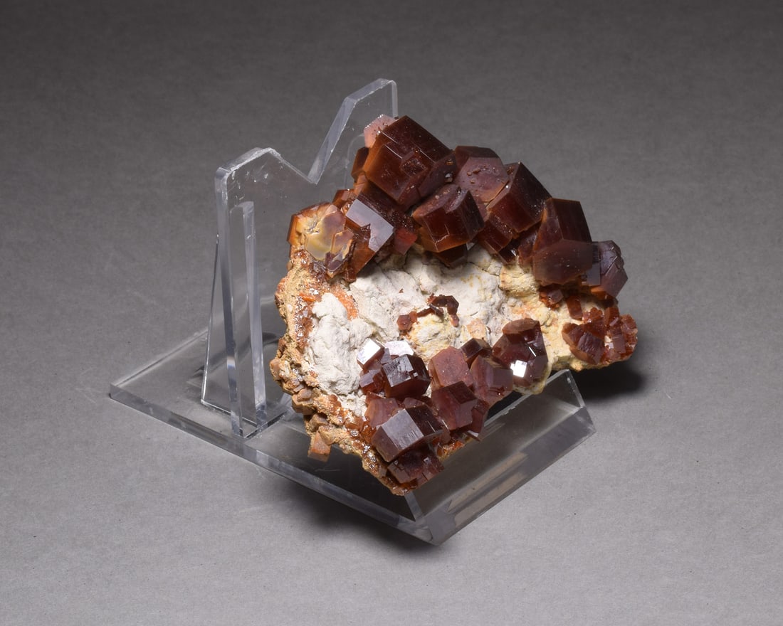Nice Vanadinite Cluster on matrix: Title: Nice Vanadinite Cluster on matrix Origin: Morocco Size: 6.5 x 5 x 2.5 cm Description: Nice vanadinite with very shiny red crystals. From the 2019 find. 115 g Reserve: $180.00 Shipping: Domestic