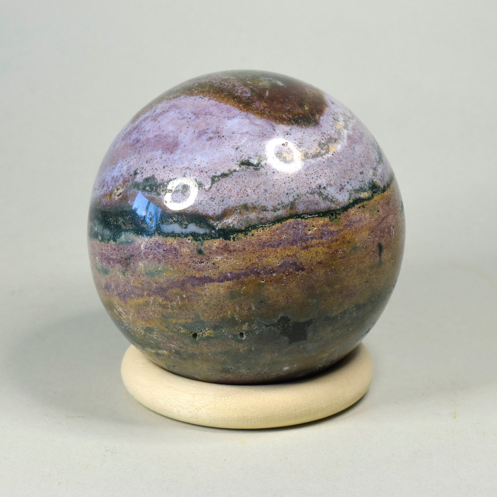 7.0 cm Polished Ocean Jasper sphere: Title: 7.0 cm Polished Ocean Jasper sphere Origin: Madagascar Size: 7.0 cm diameter Description: Species: Jasper (Ocean Jasper) Locality: Madagascar Diameter: 7.0 cm Weight: 0.43 kg Fine polished ocea