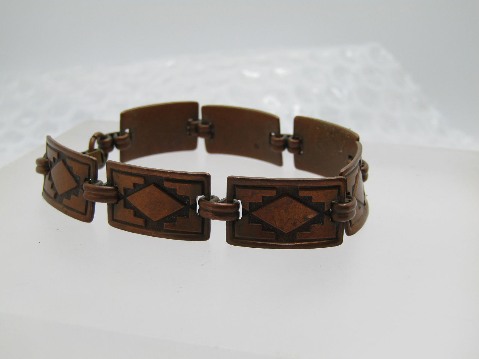 Vintage Copper Southwestern Link Bracelet, 7", Unisex, 1960's-1970's: Vintage Copper Southwestern Link Bracelet, 7", Unisex, 1960's-1970's. This has seven copper repousse southwestern links and is appx. 12mm. Flip clasp. It is not signed by the maker. Good