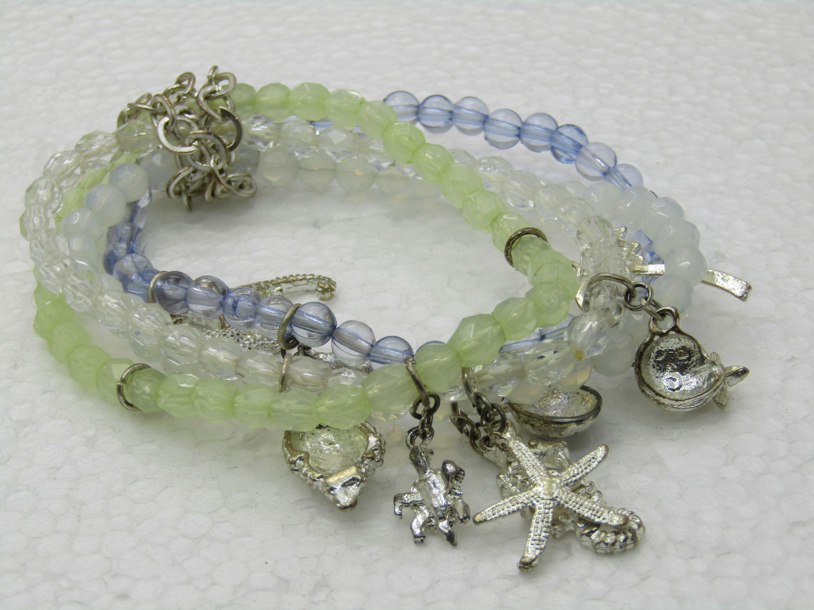 Four Seashell Beaded Stretch Bracelets, 6.5"-8" yellow/clear/white/lavender - 4