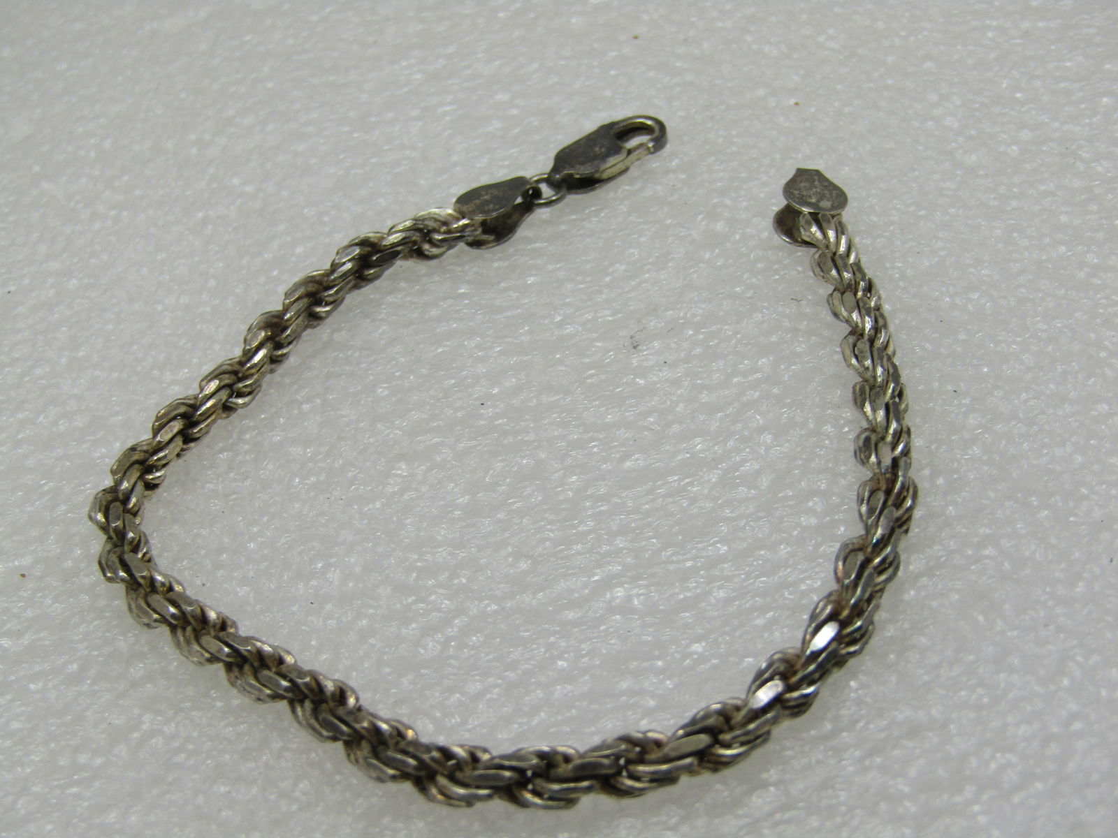 Vintage Sterling Twisted Bracelet, 4.5MM, 8.25" Unisex: Vintage Sterling Twisted Bracelet, 4.5mm, 8.25" Unisex Signed Coara. Marked sterling, tested, weight is appx. 13.82 gr. 1980's. Very good condition, light oxidation. (INV. W.3321.1X1 SS5986 J LD