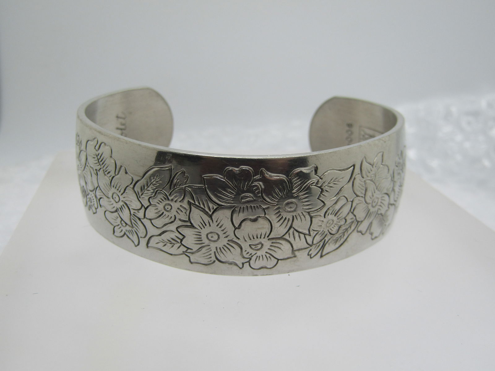 Vintage Pewter Violets Cuff Bracelet, Signed Kirk Pewter, 7.75": Vintage Pewter Violet Cuff Bracelet, Signed Kirk Pewter, 7.75" and 7/8" Wide. Engraveled violets around this cuff bracelet that has a mesurement of 7.75" and easily fits up to an 8" wrist with