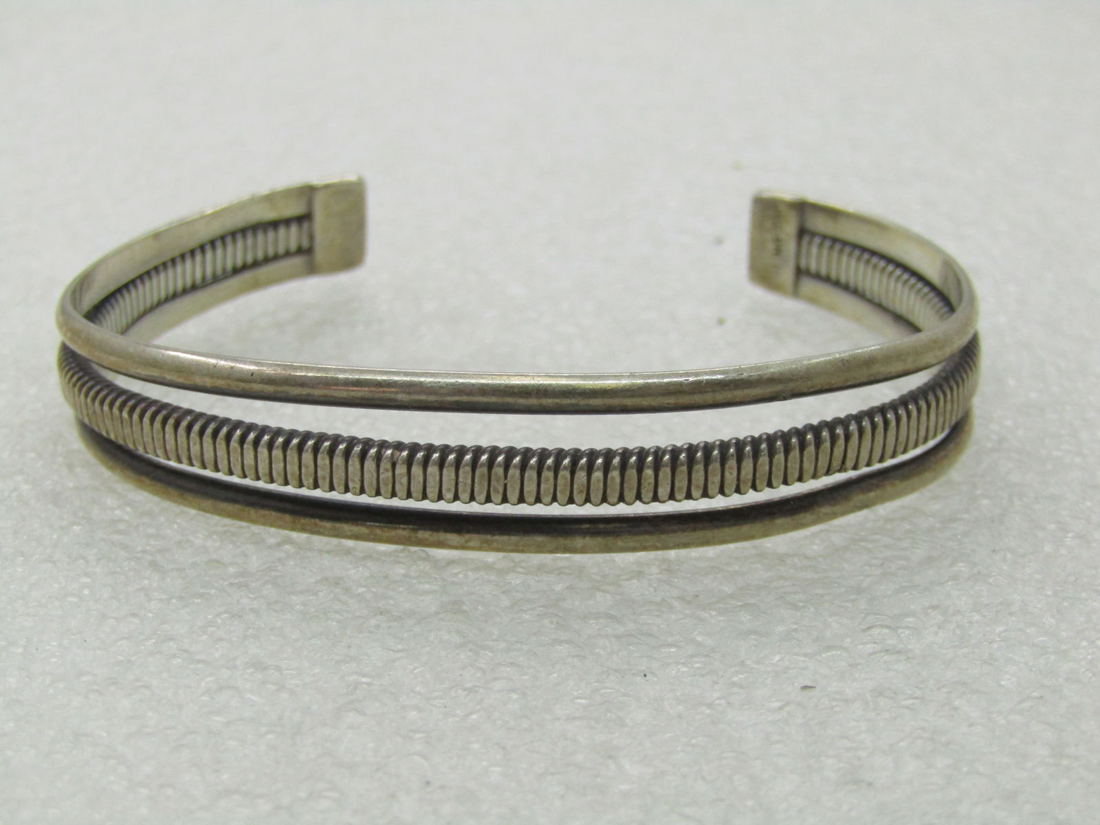 Vintage Sterling Southwestern Cuff Bracelet, three Bands, 6.25: Vintage Sterling Southwestern Cuff Bracelet, three Bands, 6.25". This is appx. 11.5mm wide and tapers to 8mm at the back of the wrist. The inside measurement is 5.5" with a 1.25" opening at back - it