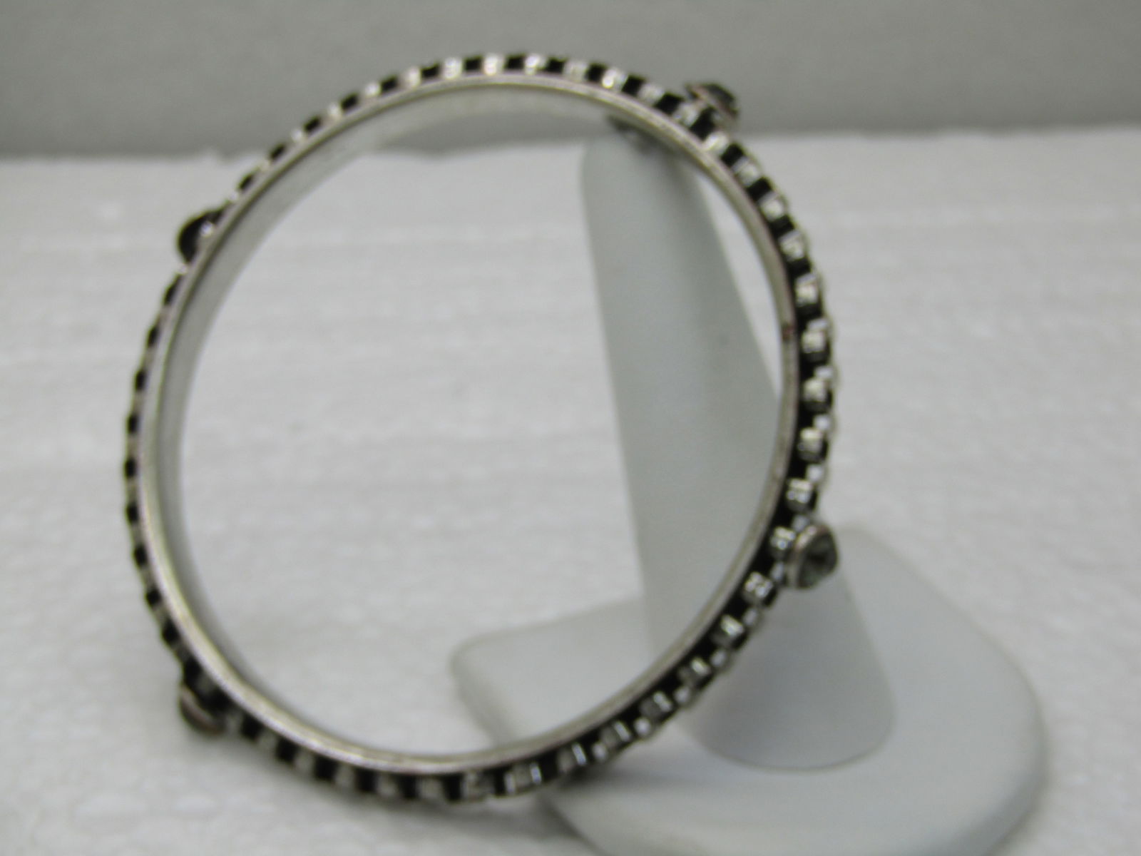 Vintage Box Link & Smoky Rhinestone Bangle Bracelet, 8.25", Silver Tone: Vintage Box Link & Smoky Rhinestone Bangle Bracelet, 8.25", Silver Tone, 2.75" opening and 6mm wide. 1980's. Very good condition. Not signed by maker. (INV. W.12X19.6 SS1495 LEB Ld 6/7/20) Reserve: $1