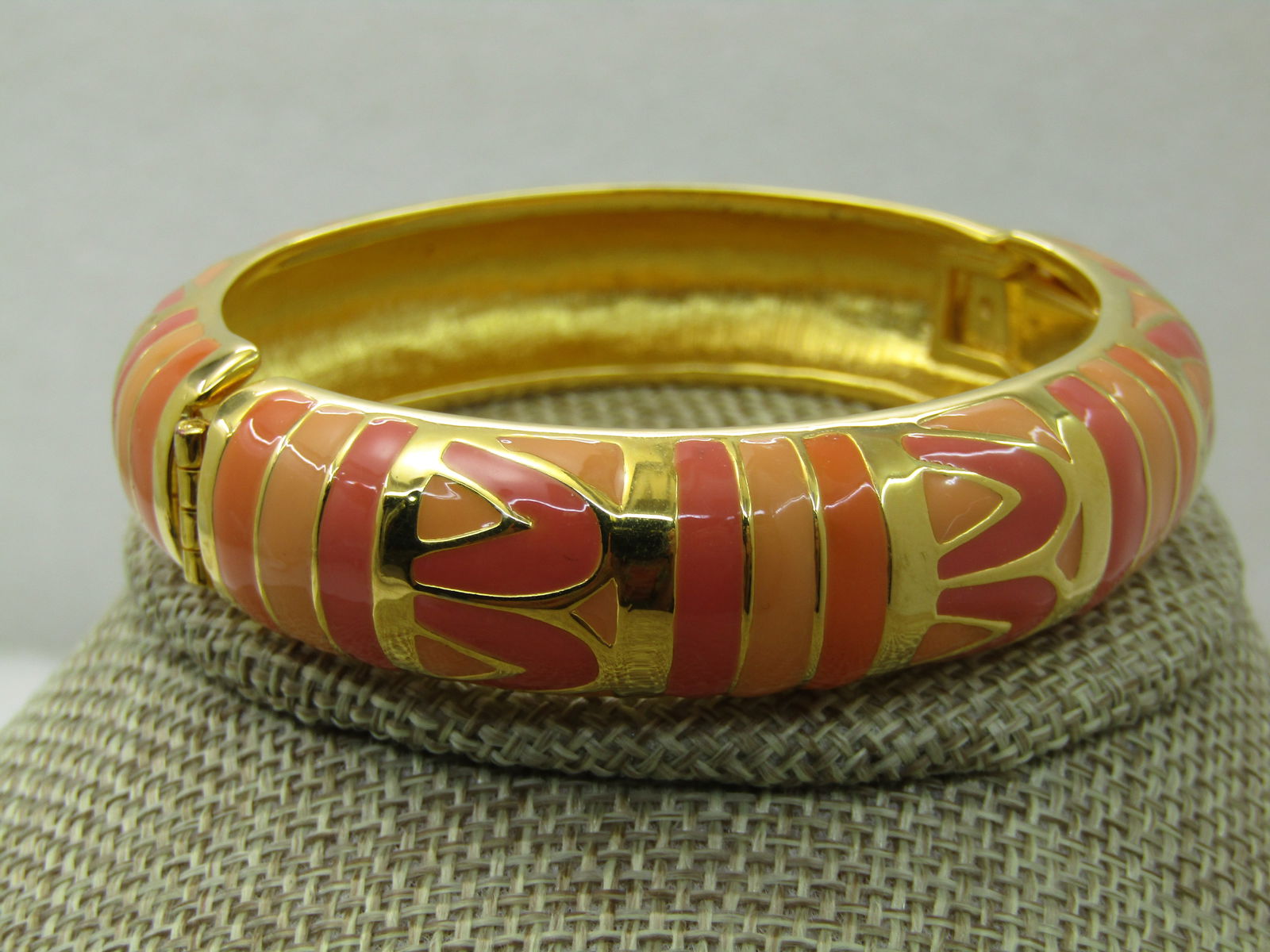 Vintage Joan Rivers Enameled Hinged Clamper Bracelet, Geometric, 6.75", 15mm wide: Vintage Joan Rivers Enameled Hinged Clamper Bracelet, Geometric, 6.75", 15mm wide, inside opening 2.25" by 2" - signed Joan Rivers. Very good condition. (INV.AZ6920,1X1 SS1877 J LD 6/29/20). 