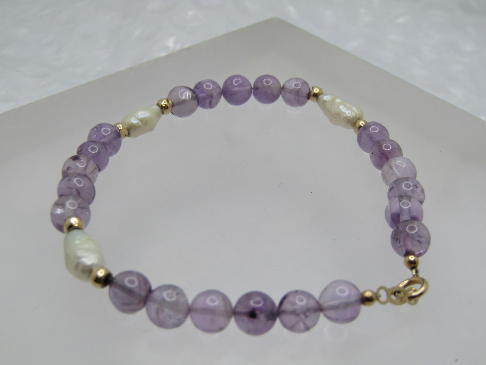 Vintage 14kt Amethyst & Freshwater Pearl Bracelet, 7", Signed H, 1980's-1990's: Vintage 14kt Amethyst & Freshwater Pearl Bracelet, 7", Signed H, 1980's-1990's. The amethyst beads are appx. 5.5mm round with 14kt gold 2.5mm beads and three freshwater pearls that are appx. 1/3"