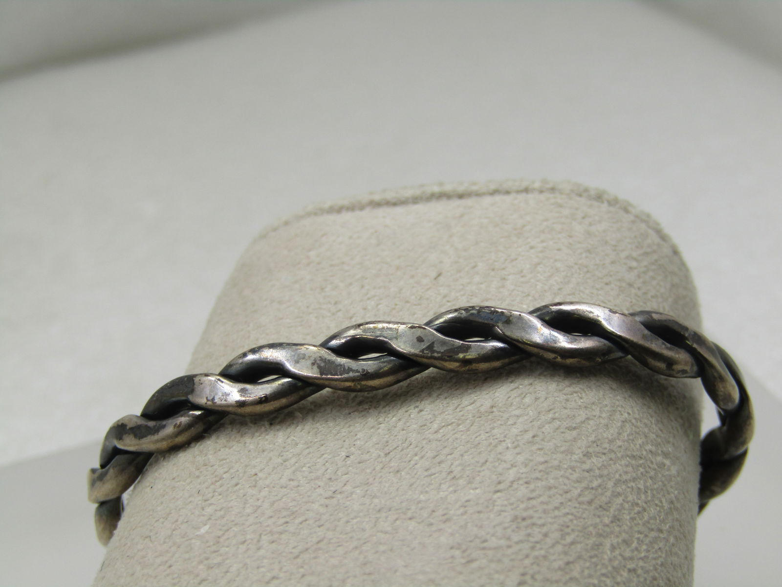 Vintage Sterling Intertwined Cuff Bracelet 6.5", 5.5mm: Vintage Sterling Intertwined Cuff Bracelet 6.5", 5.5mm. It is handmade and not marked or signed. It tests as sterling with a weight of appx. 17.90 gr. It is appx. 2.5"wide and 1.5" back to front. The