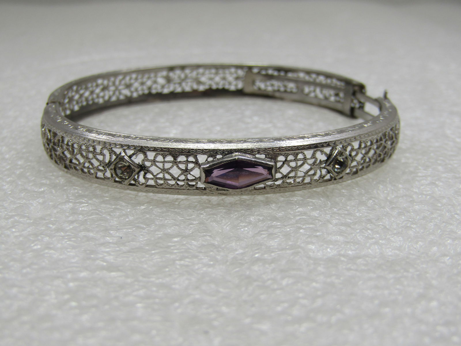 Vintage Art Deco Slide Bangle Bracelet, 7" Purple Stone, Signed RMCO.: Vintage Art Deco Slide Bangle Bracelet, Purple Stone, Signed RMCo. 7" however better for a 6.5 wrist as it has an oval shape when closed and better for slightly smaller wrist for movement. The