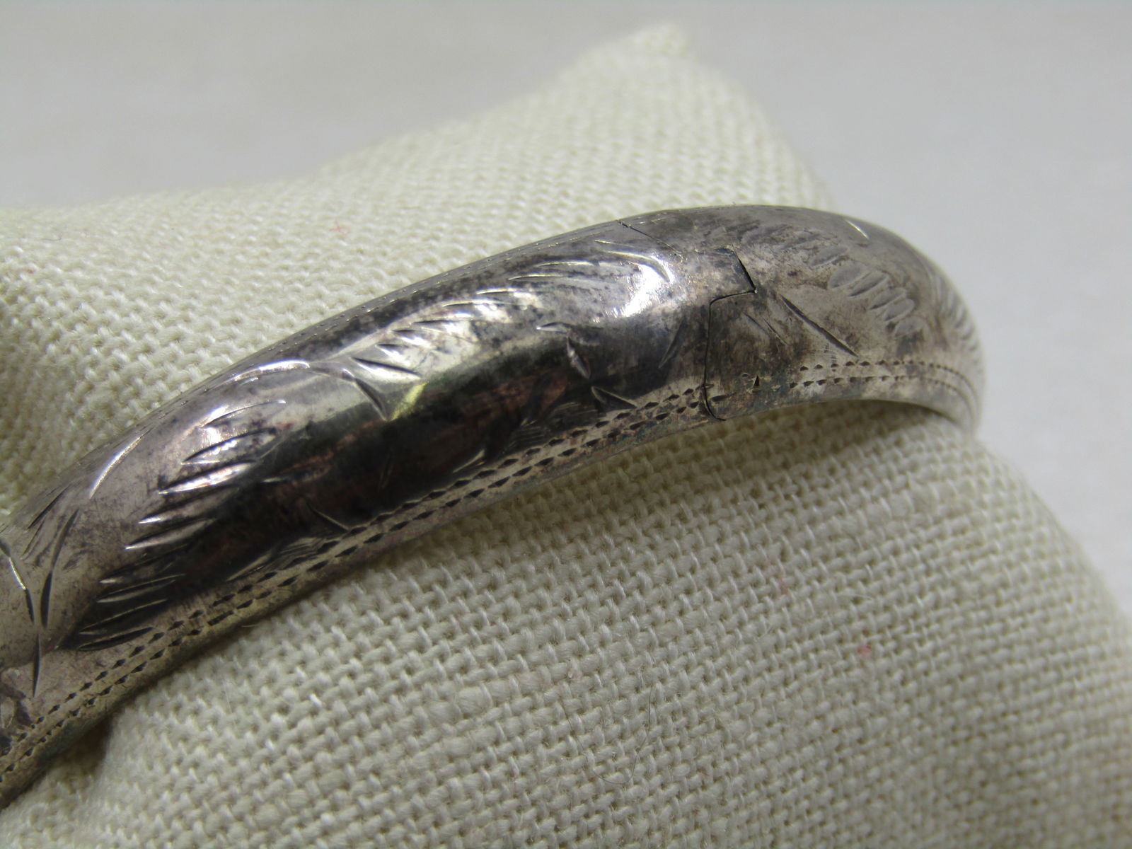 Vintage Sterling Hinged Bangle Bracelet, Safety Chain, 7.25", 11mm, Signed: Vintage Sterling Hinged Bangle Bracelet, Safety Chain, 7.25", 11mm, Signed I.S.C.T.H. Age is appx. 1960's. Sturdy bracelet that has some weight to it at appx. 17.30 gr. The opening is appx. 2.5"