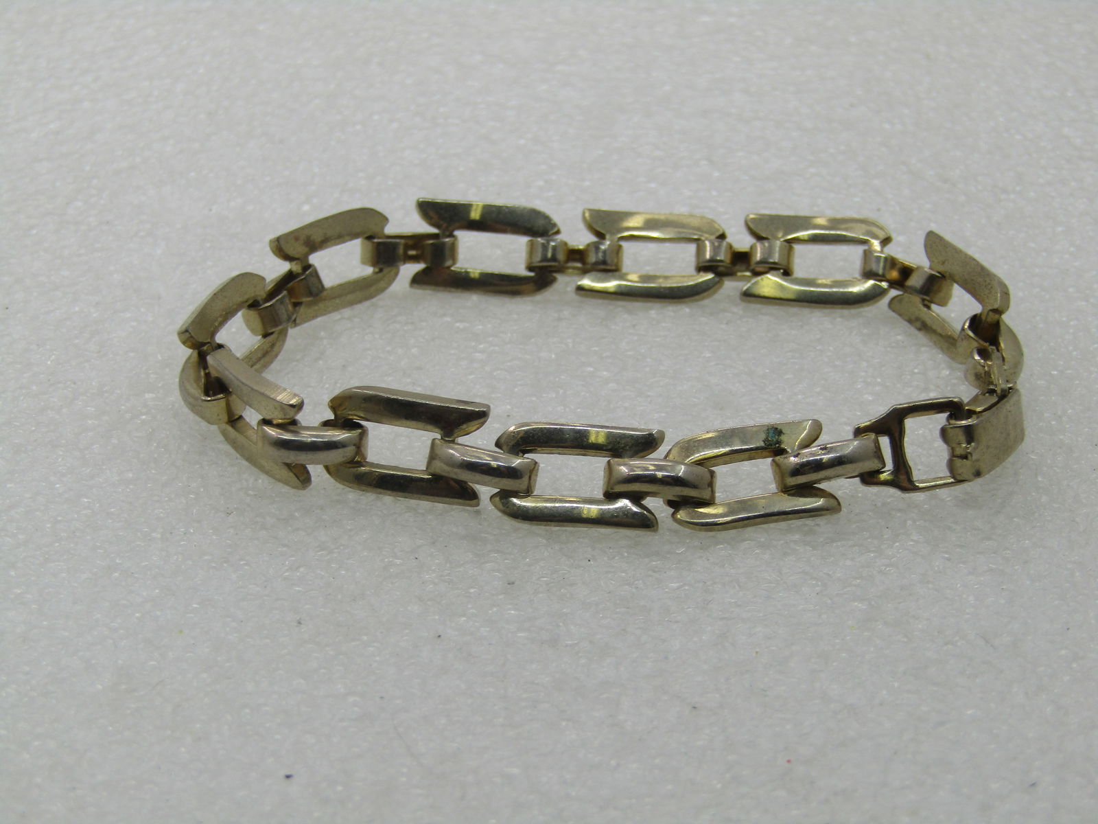 Vintage Gold Woven Link Bracelet, 7.25", Gold Tone, 1960's: Vintage Gold Woven Link Bracelet, 7.25", Gold Tone, 1960's - 1/2" tall rectangular links with a domed connector link. Flip clasp. Some light wear but still good condition. (INV. W.11.1619.5) Reserve:
