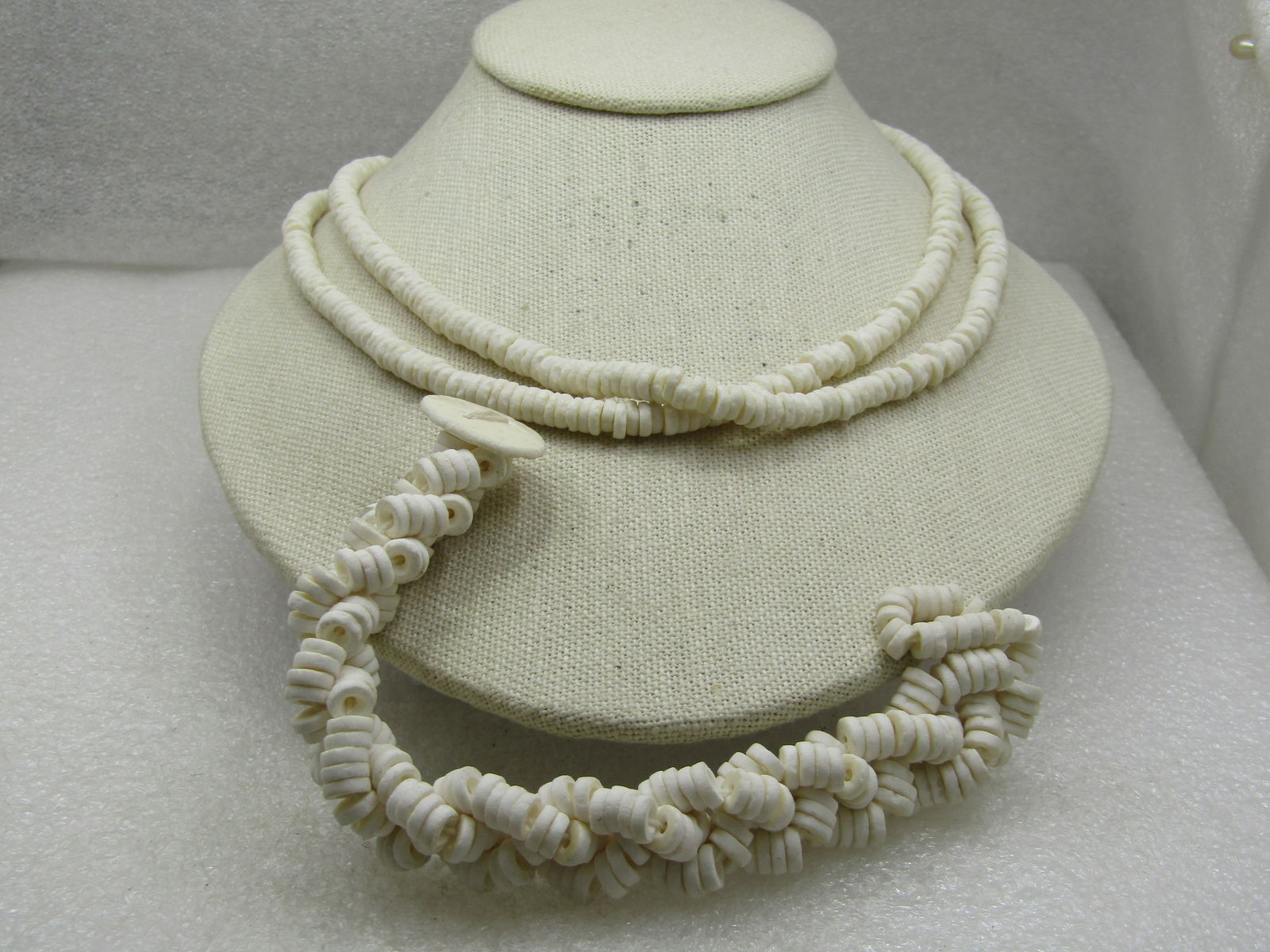 Vintage White Puka Like Necklace & Bracelet Set, 19" and 7.75": Vintage White Puka Like Necklace & Bracelet Set, 19" and 7.75". The beads in the necklace are appx. 5.5mm wide but vary in size. Single strand with a button loop and clasp. There is a woven-like