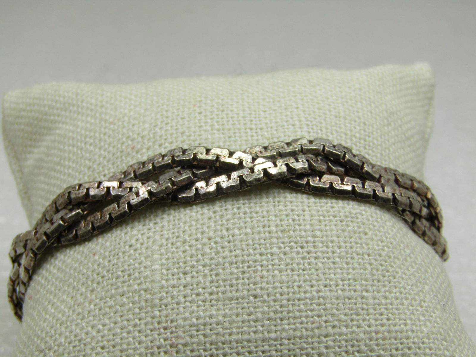 Sterling Silver 9mm S-Link Braided Bracelet, 7.25", Unisex: Sterling Silver 9mm S-Link Braided Bracelet, 7.25", Unisex, Signed ISC and marked Italy .925 and tested. Weight is appx. 19.40 gr. Heavy lobster clasp. This is a very chunky S link or serpentine style