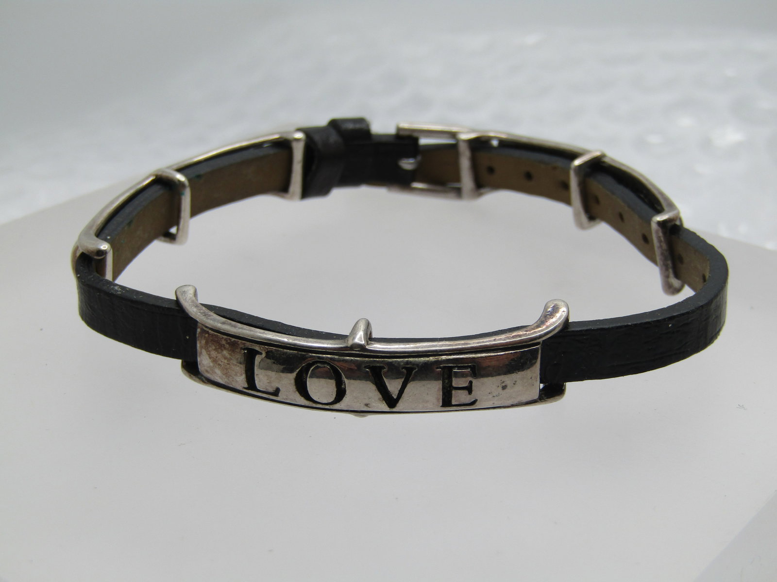 Vintage Faith, Love, Hope Bracelet, 8", Black Watchband Style, Premier Designs: Vintage Faith, Love, Hope Bracelet, 8", Black Watchband Style, Premier Designs. Black leather band that is like a watch band has three silver tone slides that are faith, love, hope that can be slid