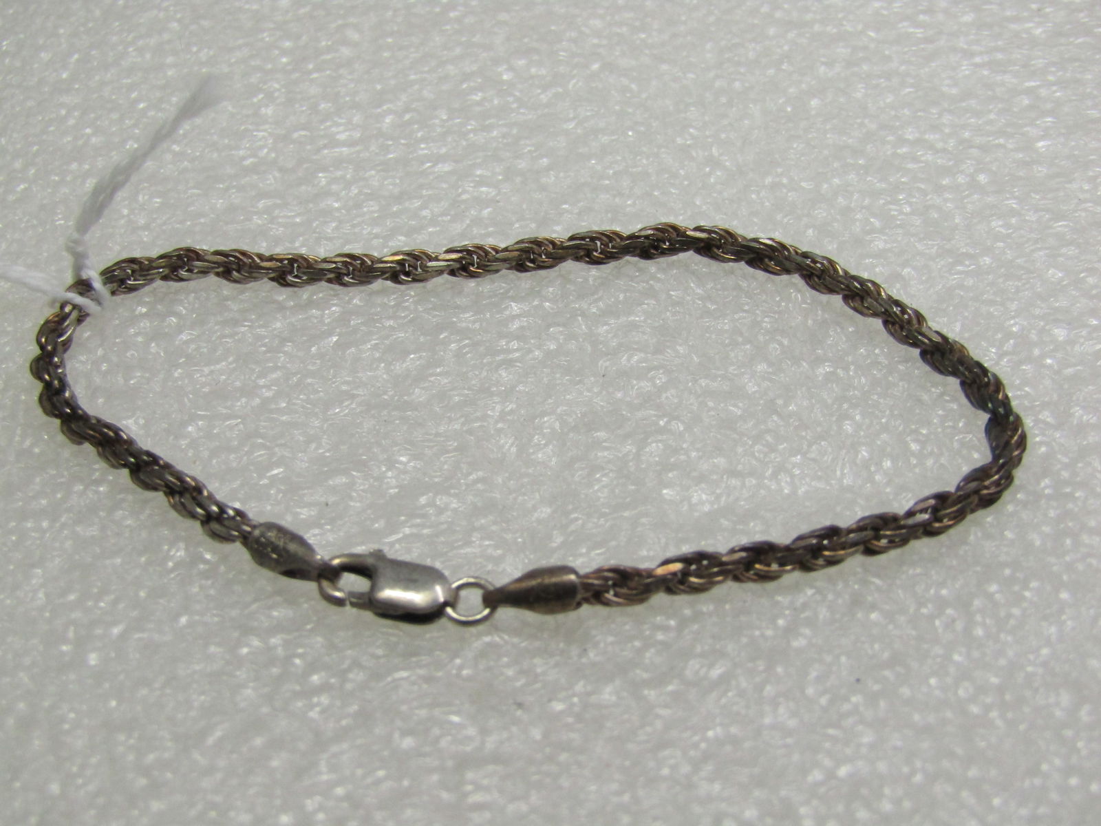 Sterling 2.5mm Rope Bracelet, 7", Unise: Sterling 2.5mm Rope Bracelet, 7", Unisex, Signed RM, marked Italy, .925, tested, weight is appx. 4.40 gr. Oxidized, will polish back to bright and shiny. Lobster Clasp. (INV. W. 11621.1X1 SS5967 J LEB