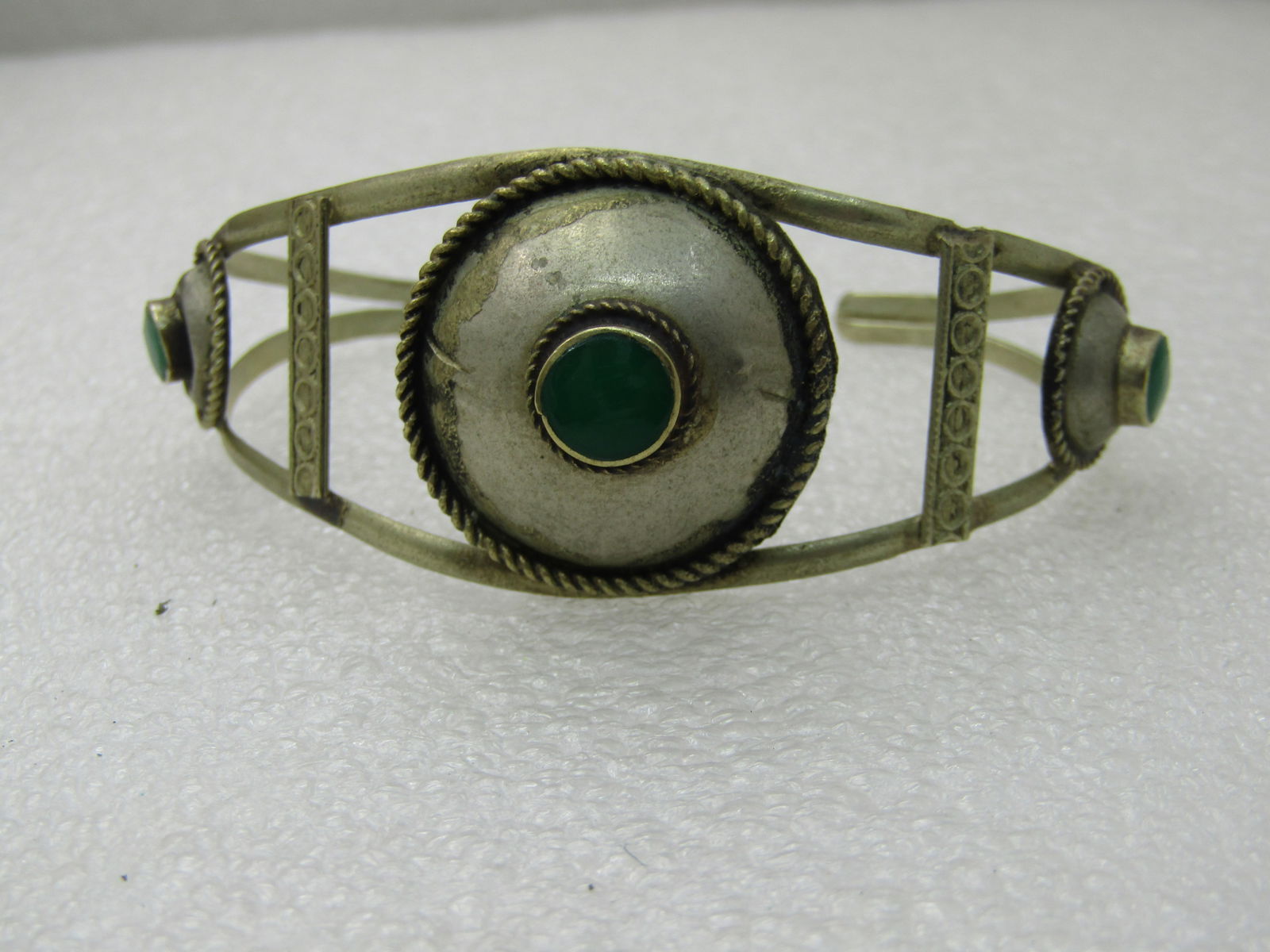 Vintage Silver Tone Green Stone Cuff Bracelet, 7", Ethnic/Tribal/Mid-Eastern: Vintage Silver Tone Green Stone Cuff Bracelet, 7", Ethnic/Tribal/Mid-Eastern - this has an inside measurement of appx. 5.75" and an opening of 1.25". This is approximately 1-1/8" wide at center and ta
