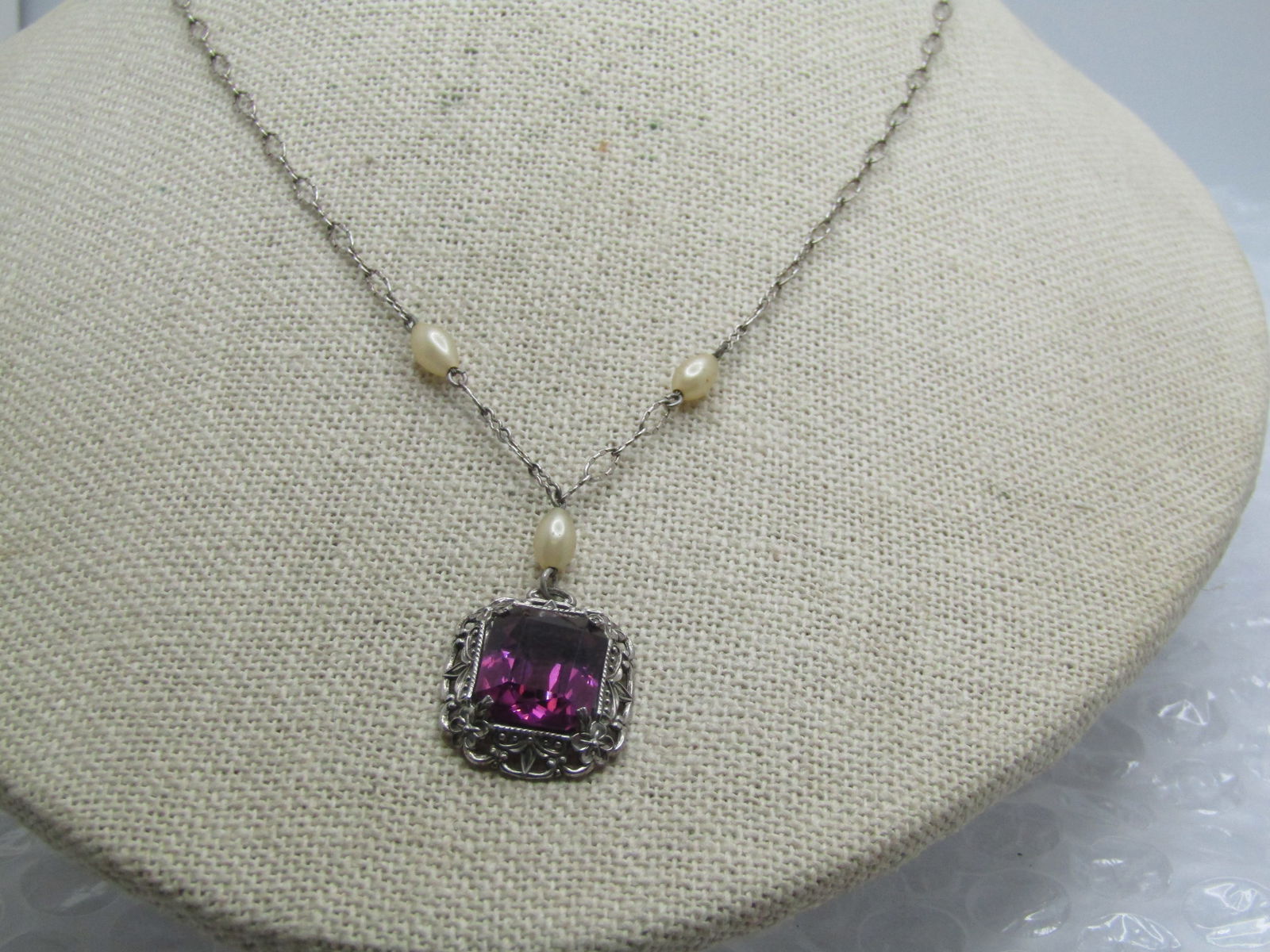 Vintage Sterling Filigree Purple & Pearl Necklace, Art Deco Themed, 16": Vintage Sterling Filigree Purple & Pearl Necklace, Art Deco Themed, 16". This has a squeeze clasp and is marked ster and tested with a weight of 4.25 gr. The pendant is 3/4" by 5/8", filigree with