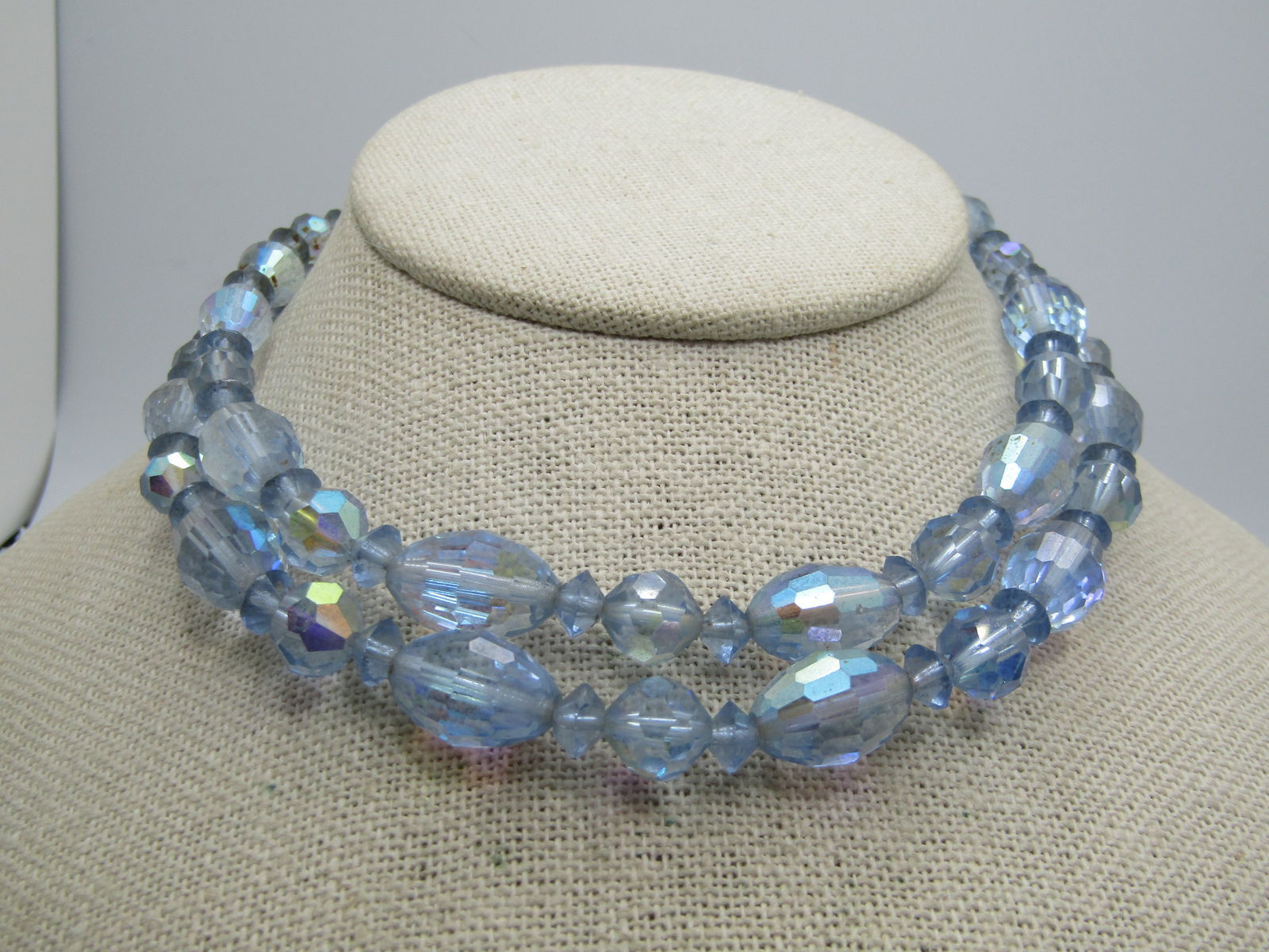 Vintage Blue AB Crystal Necklace, 15", Aurora Borealis, 1940's-1950's: Vintage Blue AB Crystal Necklace, 15", Aurora Borealis, 1940's-1950's. Double strand oval, round, diamond shaped faceted baby blue crystal beads. The strands are 12" long with a silver tone end cap
