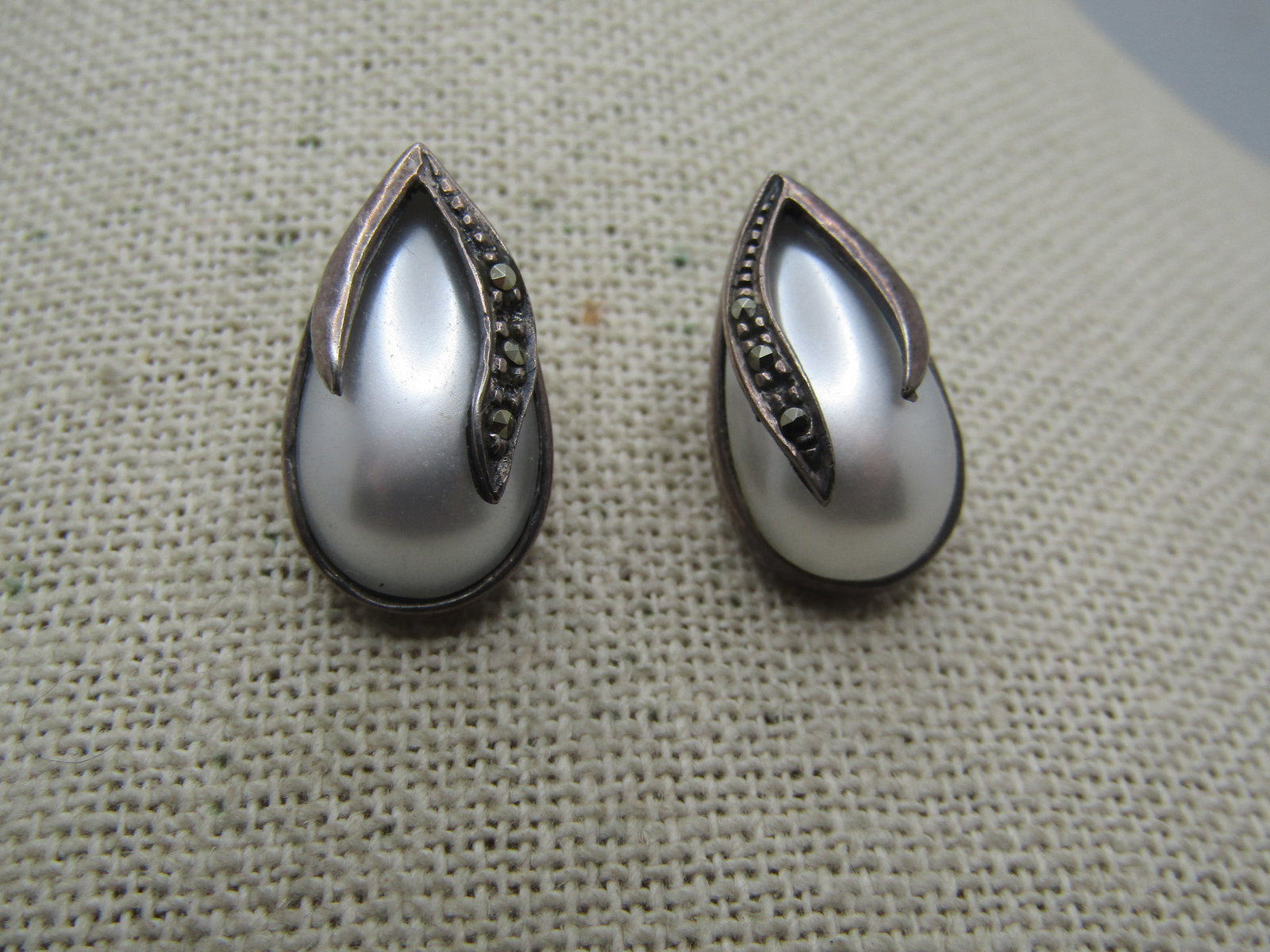 Vintage Sterling Marcasite/Faux Pearl Earrings, Pierced, 1980's: Vintage Sterling Marcasite/Faux Pearl Earrings, Pierced, 1980's. These have a bezel-set teardrop shaped pear that is appx. 18mm tall and 10mm wide with two leaf-flike drops cascading down the top of t