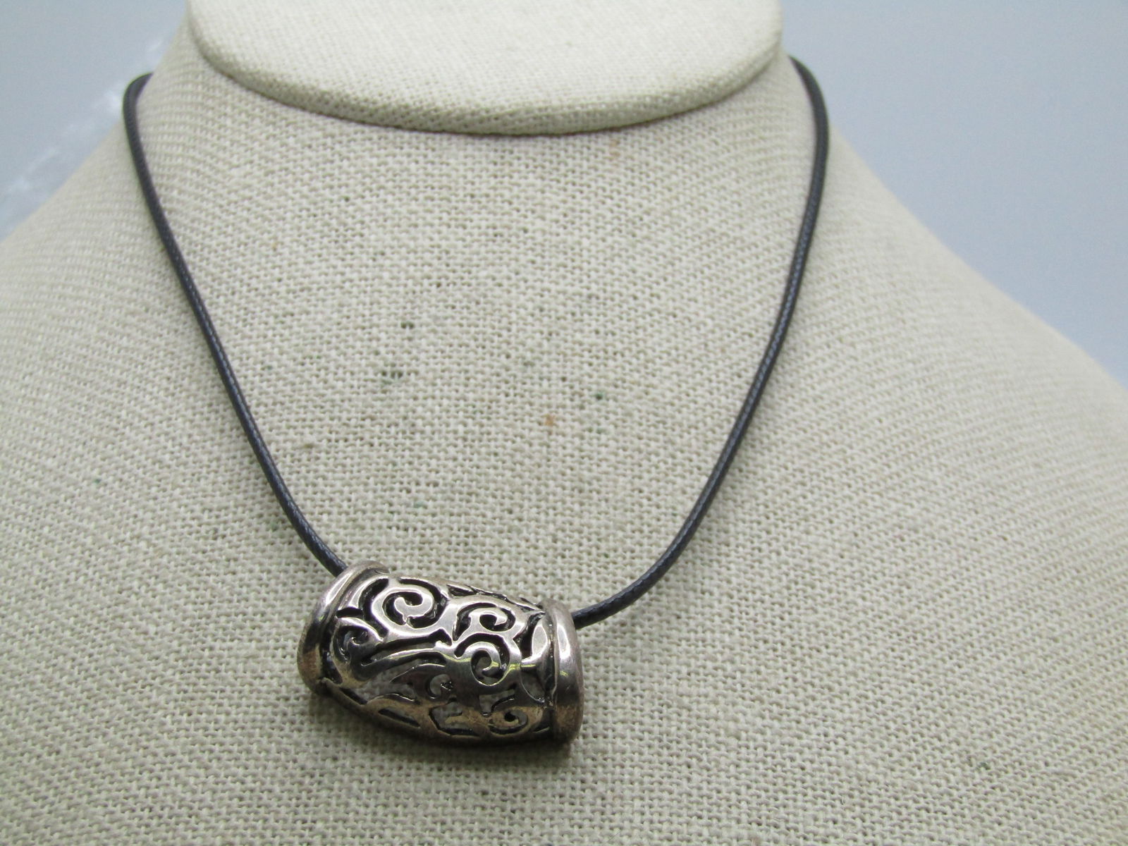 Vintage Sterling Scrolled Slide Necklace 20", 1990's: Vintage Sterling Scrolled Slide Necklace 20", 1990's. The pendant is appx. 1-1.8" wide at the bottom and 1" at the top. It is appx. 5/8" tall. It is rounded or domed on the front and marked .925 on th