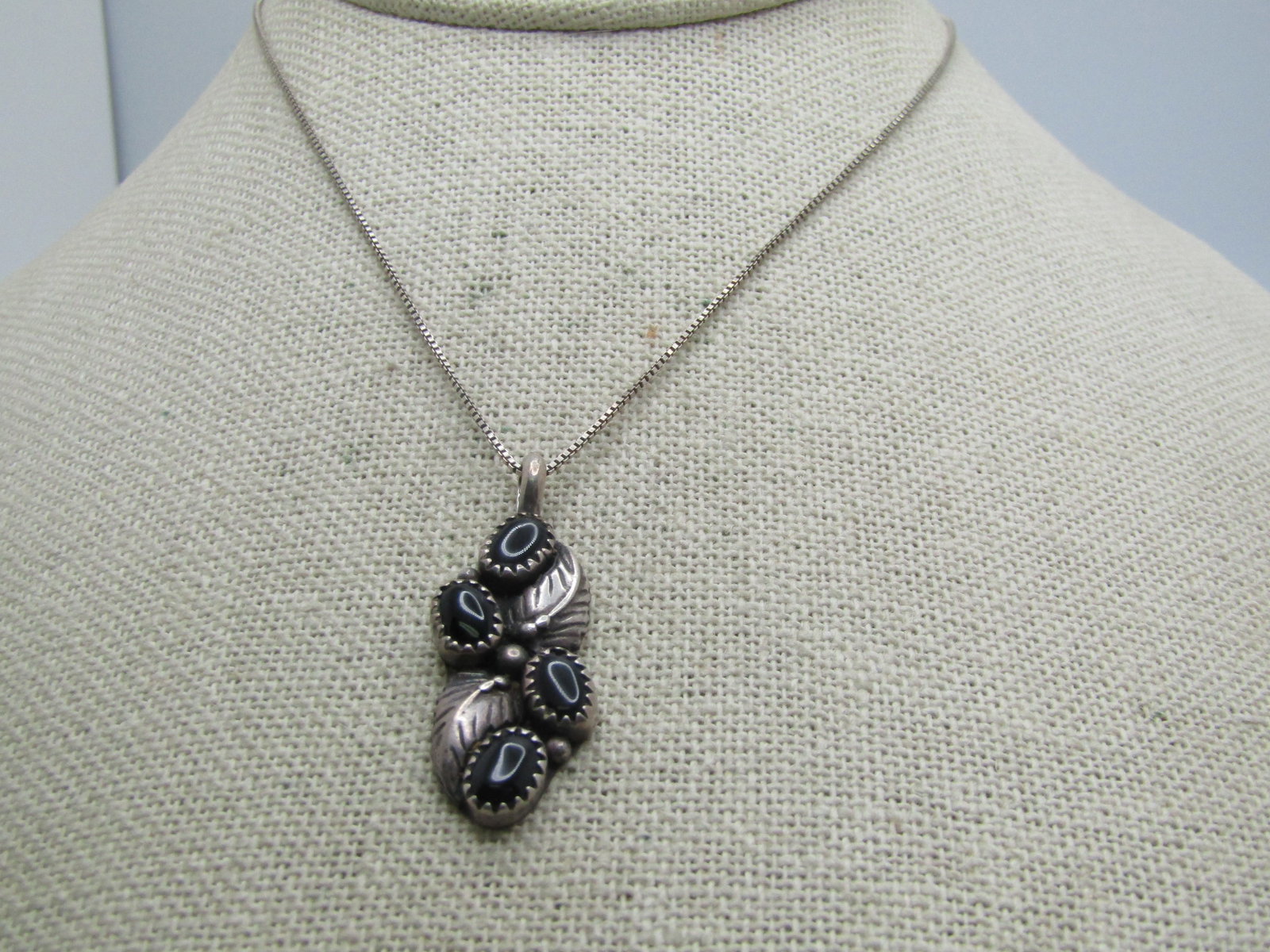 Vintage Sterling Southwestern Onyx Feather Necklace, 18", Signed Marsala: Vintage Sterling Southwestern Onyx Feather Necklace, Signed Marsala 18", Signed with an incomplete mark and is unknown. the pendant has four sawtooth bezel-set stones and is appx. 1.5" long and 5/8"