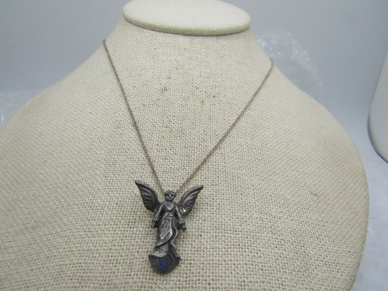 Vintage Sterling Angel Necklace with Stone, 1980's-1990's, Signed: Vintage Sterling Angel Necklace with Stone, 1980's-1990's, Signed CJ nd marked .925 and tested. Tests as sterling with a weight of appx. 4.76 gr. The angel is poised over a dark blue round stone