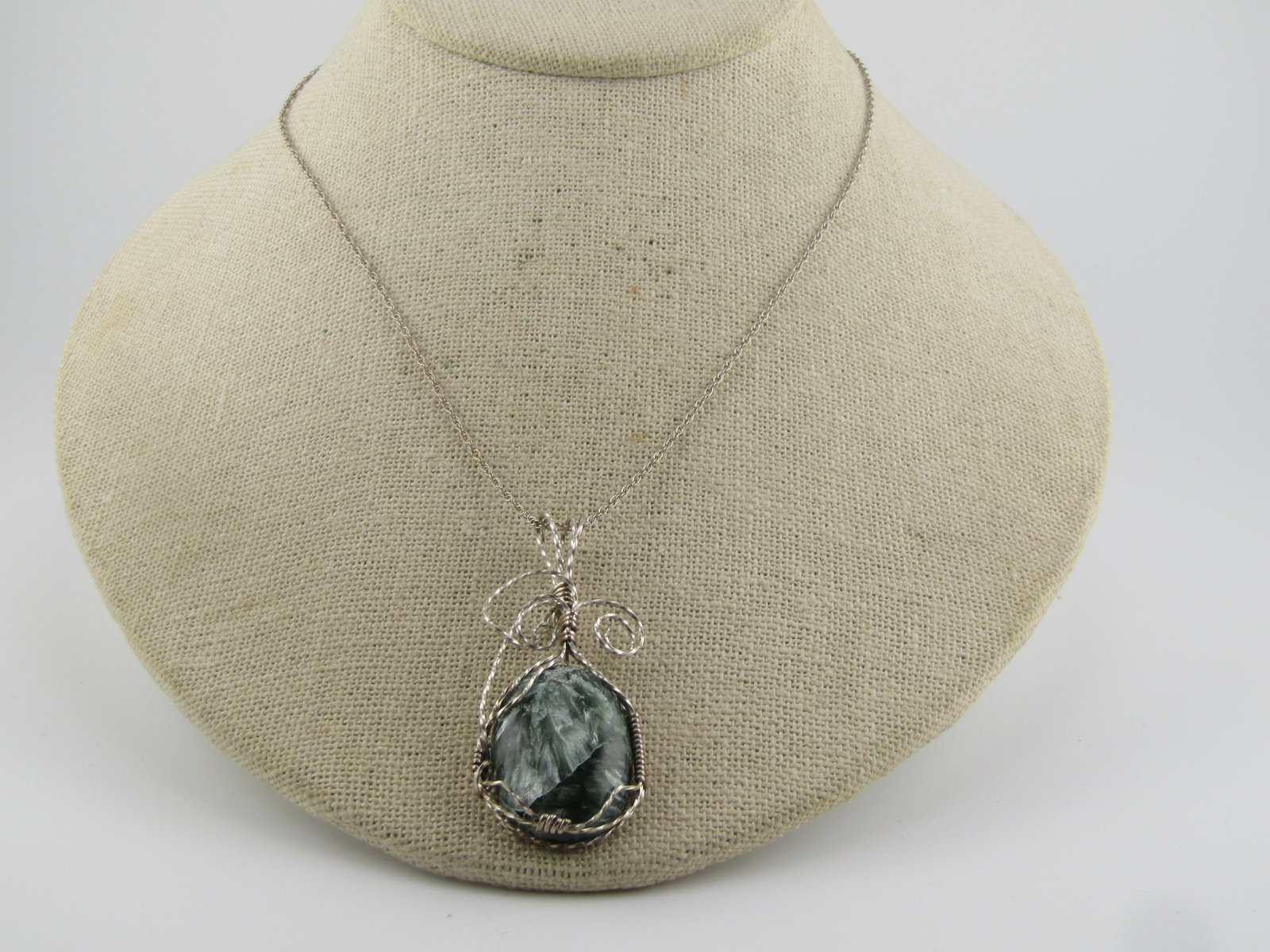 Vintage Sterling Agate Wrapped Stone Pendant, 1980'S-1990'S, NO CHAIN: Sterling Wire Wrapped Agate Pendant, 1980's-1990's, NO CHAIN. This pendant has an intricate wrapped and coiled finish on a natural green agate that is appx. 25mm tall and 19mm wide. The wire is