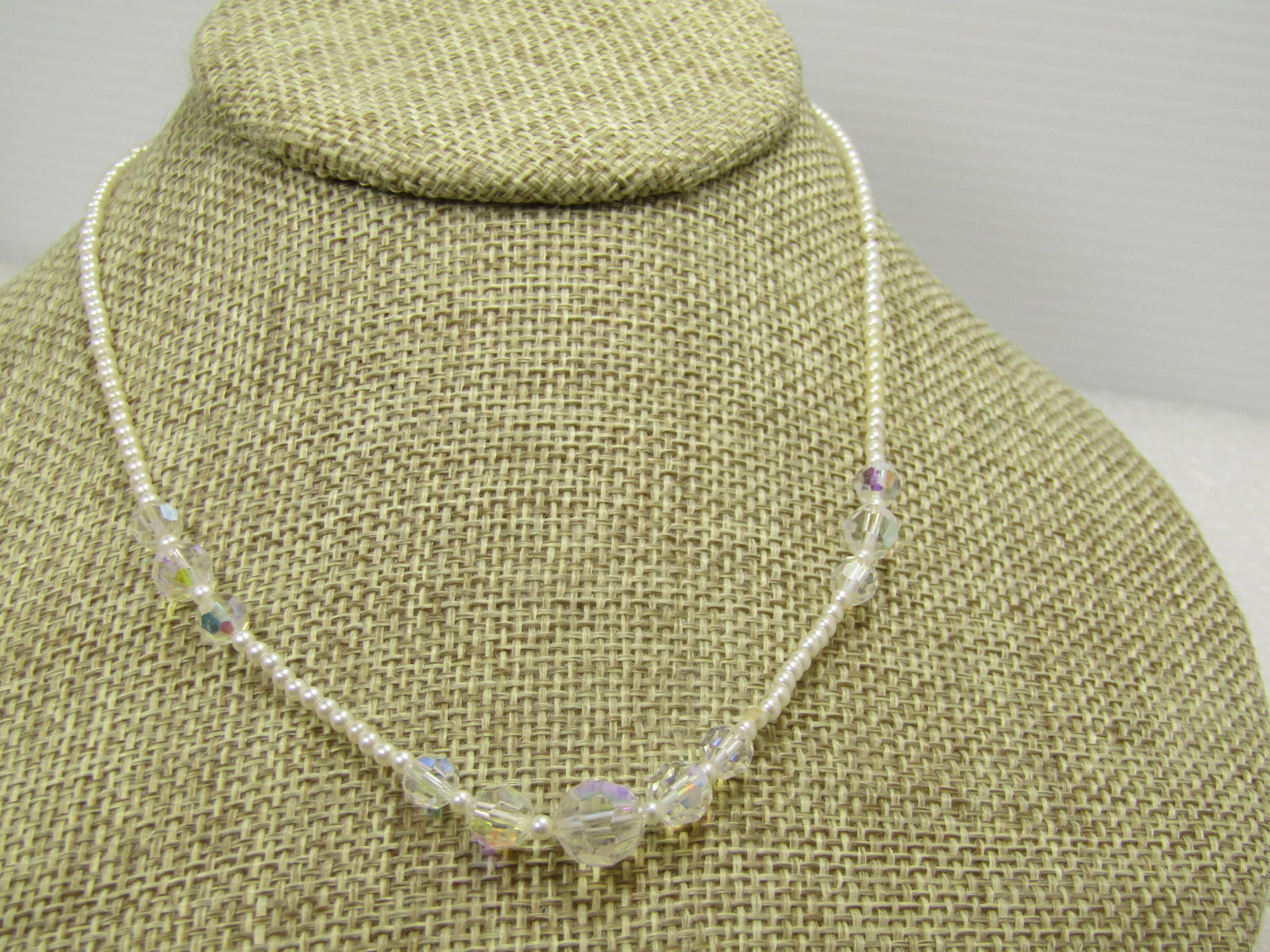 Vintage Faux Pearl Crystal Beaded Necklace, Sterling Filigree Clasp, 15", 1960's-1970's: Vintage Faux Pearl Crystal Beaded Necklace, Sterling Filigree Clasp, 15", 1960's-1970's. The pearls are small seed pearl size at appx. 2mm. White luster faux pearls with three sections of aurora borea