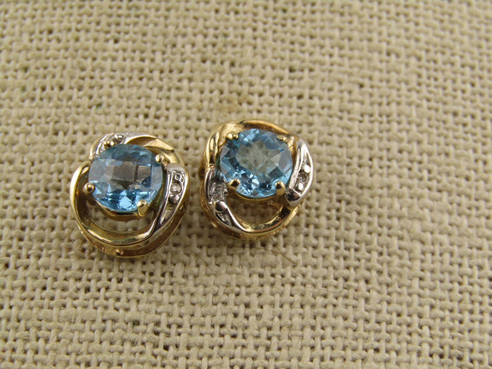 Vintage 10kt Topaz Earrings, Pierced, Studs, 1980's-1990's: Vintage 10kt Topaz Earrings, Pierced, Studs, 1980's-1990's. The earrings have 10kt posts and fronts, the back or lower portion of the earrings tests as 10kt gold over sterling. They are marked STG on