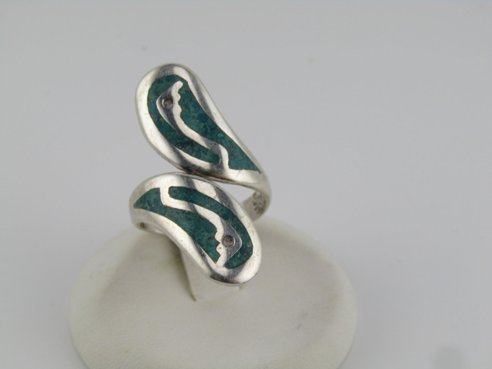 Vintage Sterling Southwestern Inlaid Turquoise Chip Ring, Bypass Adustable, 1970's-1980's. Signed: Vintage Sterling Southwestern Inlaid Turquoise Chip Ring, Bypass Adustable, 1970's-1980's. Signed with a Mexico maker's mark MFC, and Taxco, Mexico and a 3 inside a bell like shape. It is sterling