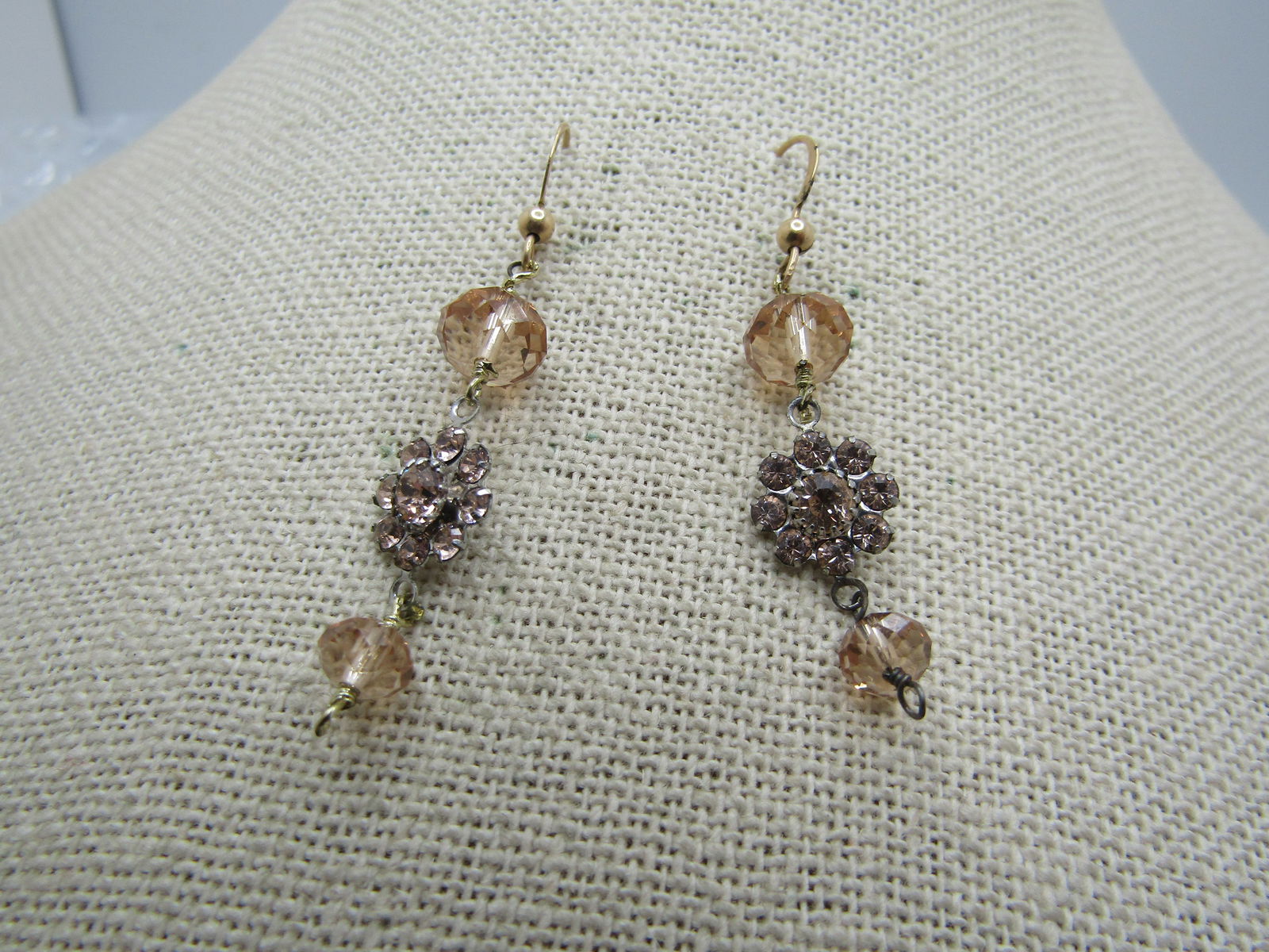 Vintage Honey Rhinestone Drop Earrings, Pierced: Vintage Honey Rhinestone Drop Earrings, Pierced. Gold tone hook post hearrings that are appx. 2" long and have an 8mm glass or crystal faceted bead on top and a 5mm matching bead on the bottom. In the