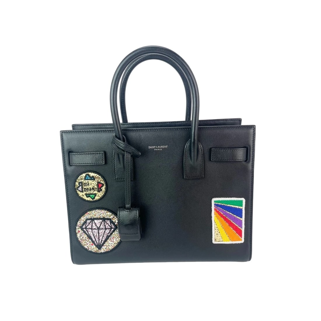 Saint Laurent Sac De Jour Embellished Patches Black Leather Shoulder Bag: Title: Saint Laurent Sac De Jour Embellished Patches Black Leather Shoulder Bag Description: Pre-Owned 100% Authentic Saint Laurent Sac De Jour Embellished Patches Baby Black Leather Shoulder Bag RATI