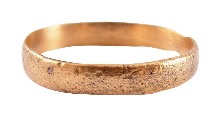 VIKING WEDDING RING 9TH-11TH CENTURY AD, SIZE 10 1/4: Late 9th-early 11th century AD. Size 10 1/4. 53.7mm low rounded face band. Light surface texture from burial. Vikings exchanged rings on the pommel of the groom's sword. Professionally refurbished wit