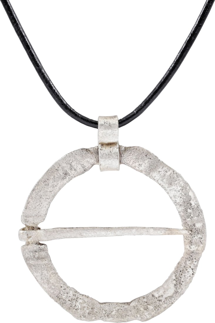 RARE VIKING PROTECTIVE BROOCH, 10th-11th CENTURY AD: Bronze, 1 3/4” (1.81”) diameter. Four segments, each with transverse banding at the ends. Slotted for the captive cross pin. Worn in multiples attached to leather or heavy wool jerkins, th