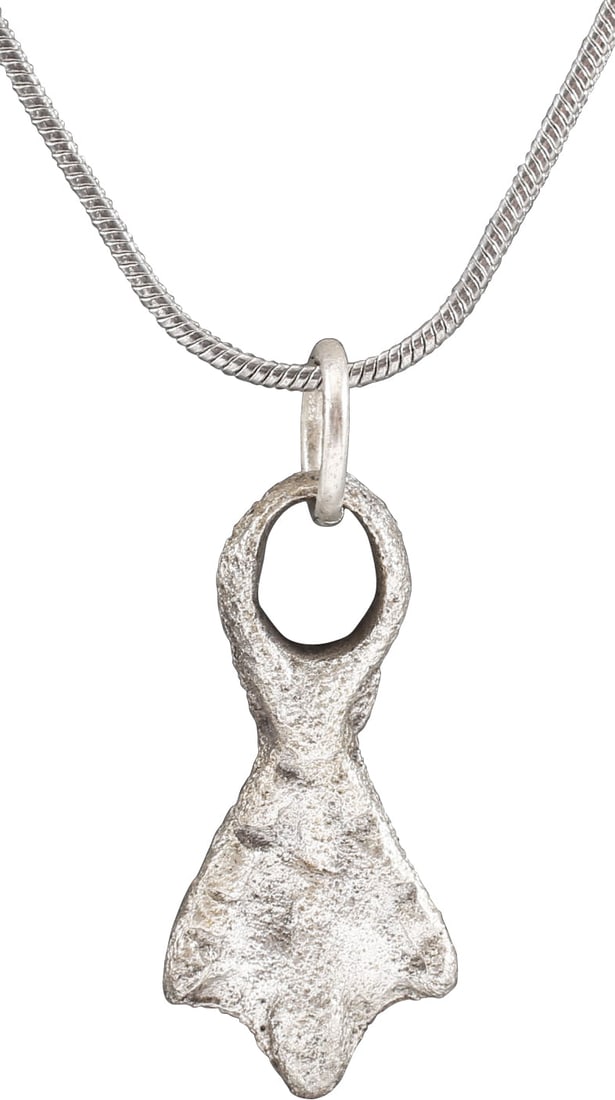 ANCIENT VIKING SORCERER'S AMULET 10TH-11TH CENTURY AD.: Just under 1" (0.98") in height. Bronze shaped as a duck's foot and intricately detailed and especially well delineated. A burial at Viden, Denmark contained the body of a woman of wealth and status b