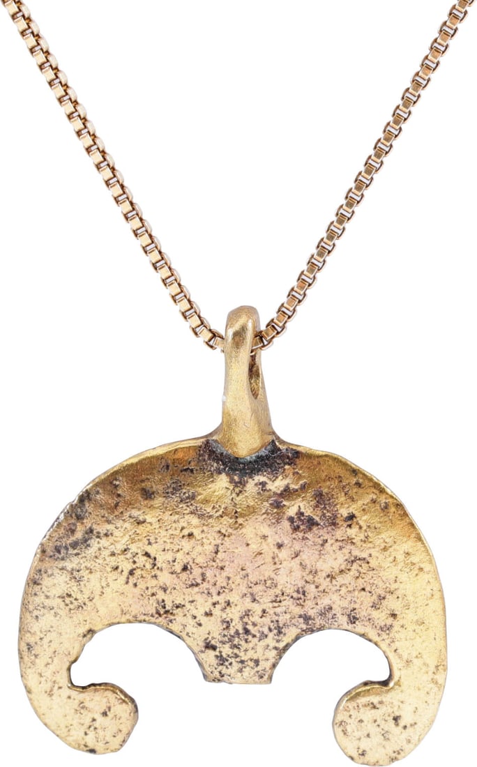 VIKING LUNAR PENDANT NECKLACE: Late 10th-11th century AD, the late period of Viking pagan mythology. Formed as a crescent representing the moon which was sacred to Vikings both for navigating and as the source of light for nocturna